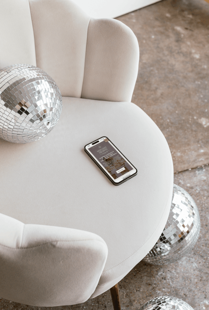 iphone sitting on chair showcasing a sample website in the is Wix a good-website platform debate. 