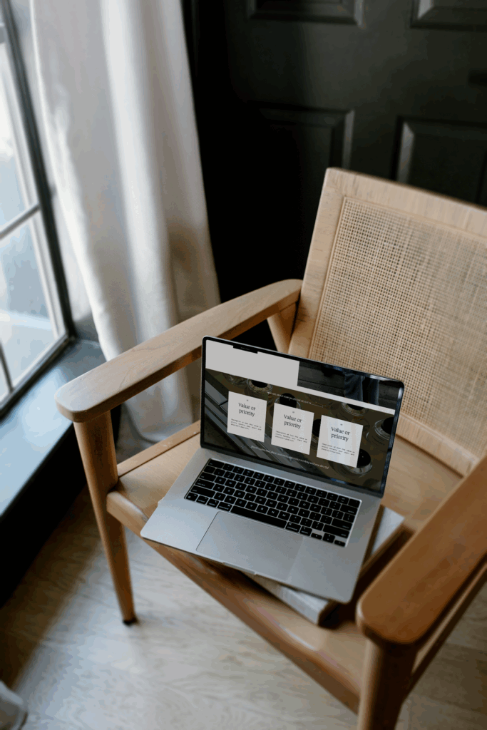 Computer on chair giving visual overview of custom website vs template homepage design. 