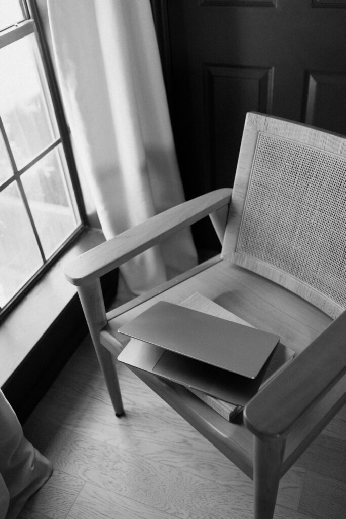 Closed computer ready to open to share step-by-step process to customize website template for a branded business site. 