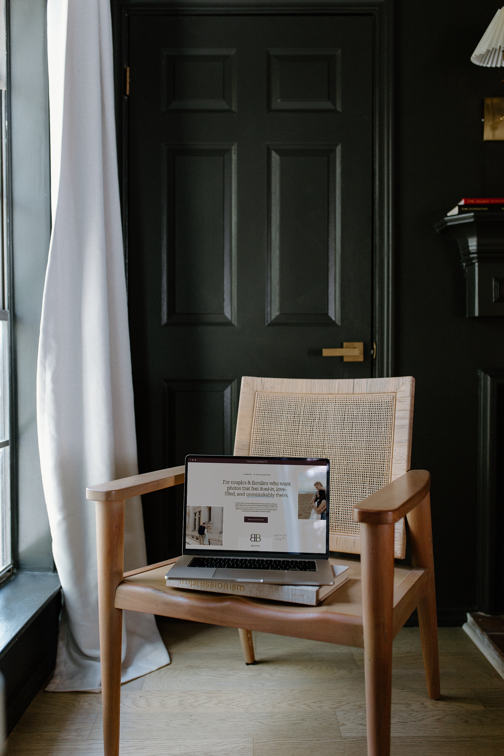 Laptop on chair showing best of photography websites with modern photography website mockup.